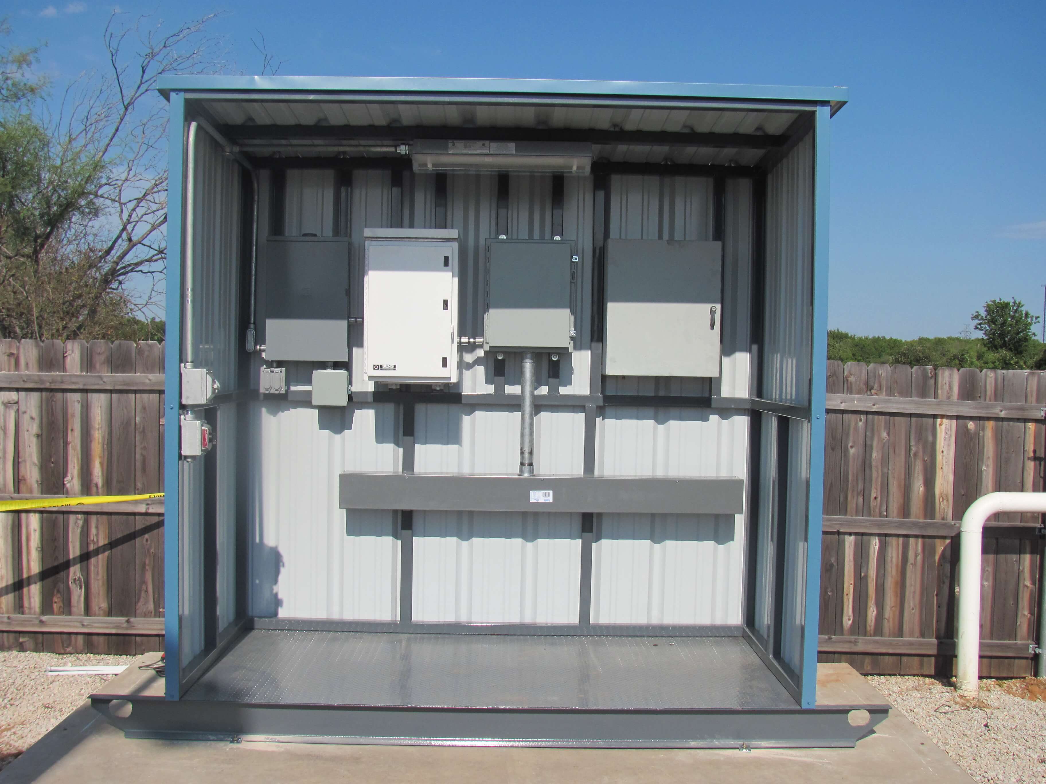 TICO fabricated instrument shed protecting field equipment