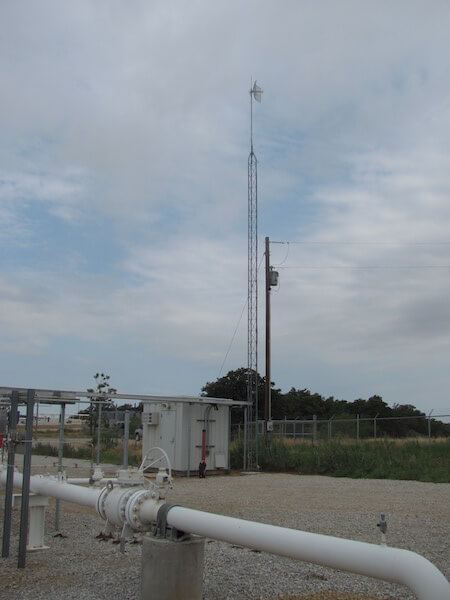 TICO crew installing a free standing radio tower